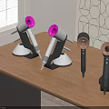 Modern Hair Dryers With Pink Black White Nozzles On Wooden Table Stand