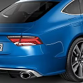 Blue Audi Sports Sedan With Sleek Exterior Design And Alloy Wheels