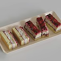 Five Sliced Cakes on Light Colored Tray with Cream and Berries and Different Colors