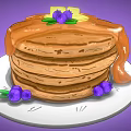 Delicious Stack of Pancakes With Butter Drizzled Syrup and Fresh Blueberries