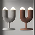 Modern U Shaped Table Lamps With Gray And Brown Textured Bodies And Round Bases