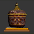 Decorative Container With Intricate Colorful Geometric Patterns And Gold Accents On Red Yellow Base