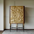Elegant Ornate Console Cabinet with Golden Carved Patterns Brown Body and Black Metal Base
