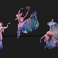 Women Dancing With Dynamic Movements In Colorful Flowing Dresses Against Black Background