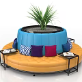 Colorful Circular Public Chairs With Cushions Plants And Side Table Setup