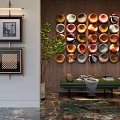 Colorful Circular Wall Decor Arranged On Wooden Wall With Green Plant And Marble Floor
