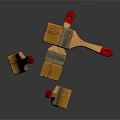 Wooden Paintbrushes With Red Handles And Yellow Bristles On Dark Surface