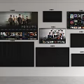 Multiple Televisions in Showroom Display Various Sizes Showing Movies Series