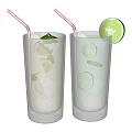 Refreshing Yellow Green Drinks in Tall Glasses with Straws Lemon Slices and Mint Leaves