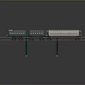 Model Train With Blue And White Carriages On Elevated Green Pillar Track Dark Background
