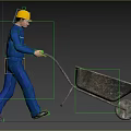 Man in blue work uniform with yellow hard hat pushing a wheelbarrow