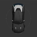 Modern Black Sports Car With Sleek Design Rear Spoiler And Sporty Alloy Wheels