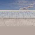 Football Field with White Goalpost Net Under Blue Sky and White Clouds