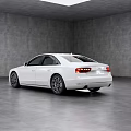 White Audi Luxury Sedan Parked In Minimalist Gray Interior With Skylight And Spacious Floor