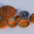 Terracotta Ceramic Vessels with Yellow Floral Patterns Including Lidded Pots Mortar Bowls and Plates