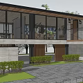 Modern Single Family House Exterior Design With Large Glass Windows And Lush Greenery