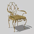 Ornate Wrought Iron Armchair With Curved Arms Gold Frame And Patterned Upholstery
