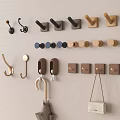 Various Wall Mounted Hooks With Diverse Wooden Metal Designs And Assorted Colors For Home Decoration