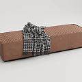 Modern Brown Sofa Bench With Tufted Surface And Black White Houndstooth Blanket