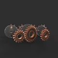 Various Colored Metal Gears in Different Sizes Arranged Together on Dark Background