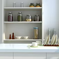 White Kitchen Countertop With Shelf Holding Storage Jars Bowls Cup Plates And Potted Plant