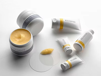 Reverse Skincare Products Open Jar Cream and Tubes with Yellow Formula 3d model
