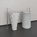 White Marble Stacked And Cylindrical Striped Washbasins With Metal Faucets Against White Wall Gray Floor