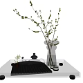 Elegant Tea Set With Glass Teapot Black Wavy Background Green Plants On White Tabletop