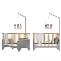 Wooden Baby Crib With Cloud Mobile And Soft Blanket In Natural Tone