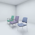 Three Colorful Armchairs with Green Purple Blue Upholstery and Metal Frames in White Room