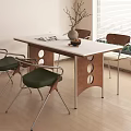 Dining Table Set With White Tabletop Wooden Legs Circular Cutouts Green Seats And Metal Frames