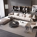 Modern Beige Sofa with Decorative Pillows and Round Black Coffee Table Set in Living Room