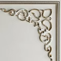 White Background Wall With Rock Texture Golden Accents And Ornate Frame