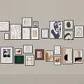 Stylish Photo Wall With Various Frames And Different Artworks On Neutral Wall