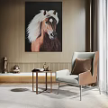 Elegant Modern Accent Chair With Throw Pillow Side Table And Horse Painting Against Wooden Wall