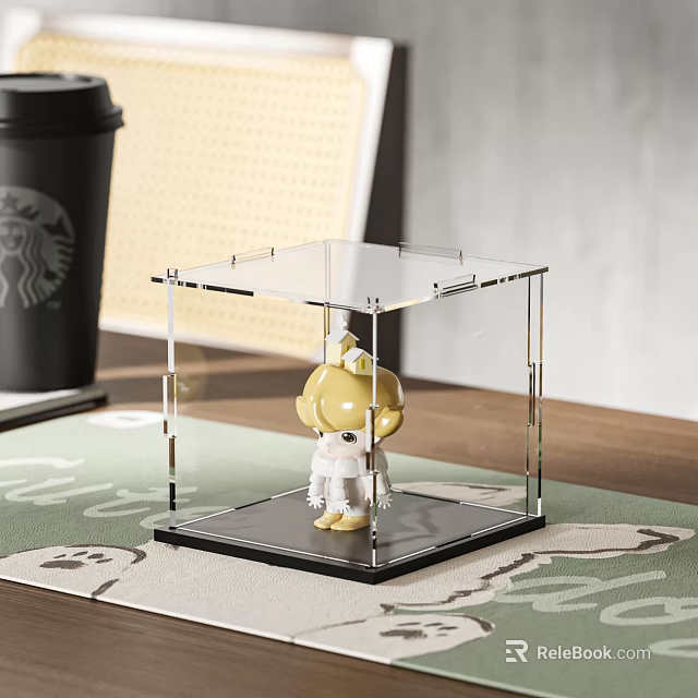 Cute Yellow Doll In Clear Transparent Display Case Placed On Table With Green Mat Background 3d model 