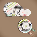 Colorful Dinnerware Set With Striped Polka Dot Plates And Clear Glasses For Table Setting
