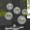Indoor Landscape Featuring Hanging Glass Globes With Green Plants And Decorations