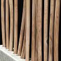 Wooden Slatted Room Divider With Curved Vertical Strips For Interior Partition