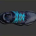 Stylish Blue Sneakers With Turquoise Laces And Colorful Speckles On Purple Sole