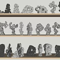 Unique Stone Figurines Neatly Arranged On Wooden Shelves For Home