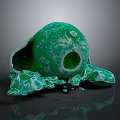 Green Cracked Stone Sphere With Scattered Broken Fragments On Surface