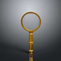 Vintage Golden Magnifying Glass With Ornate Handle And Clear Lens