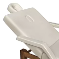Modern Lounge Chair Featuring Beige Upholstery Dark Wooden Frame And Storage Shelf