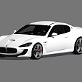 White Maserati Sports Car With Sleek Exterior Design And Alloy Wheels