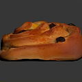Golden Orange Sweet Spiral Roll With Raisins Shiny Surface On Dark Background
