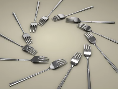 Silver Cutlery Set Featuring Forks Arranged In Circular Pattern On Light Background 3d model