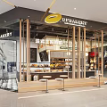 SpeakBakey Bakery Modern Storefront With Glass Windows Display Cases Fresh Pastries And Seating