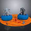 Two Elephant Dolls On Blue Bean Bags With Colorful Blocks Small Toys And Orange Carpet