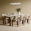 Modern Dining Table And Chairs Set With White Tabletop Beige Seats Wooden Legs And Vase